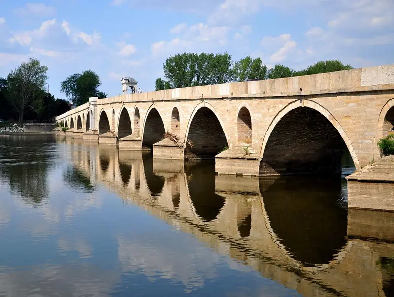 The Meriç Bridge in Edirne and its reflection in the river